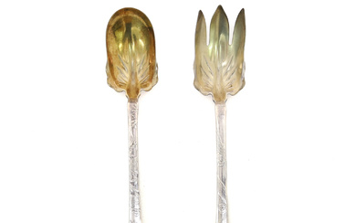 TIFFANY & CO. A PAIR OF AMERICAN STERLING SILVER JAPANESQUE PATTERN SALAD SERVERS.