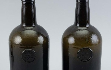 TWO APPLIED LABEL BOTTLES Late 18th/Early 19th Century Heights approx. 9.75”.