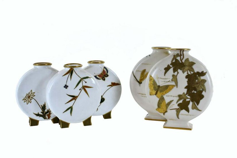 TWO ROYAL WORCESTER GILT DECORATED BUD VASES