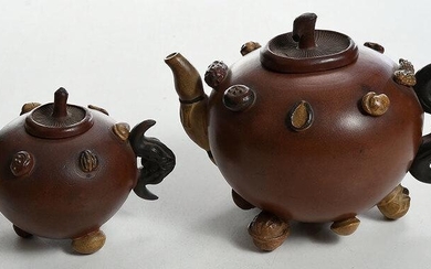 Two Chinese Yixing Nut and Seed Teapots