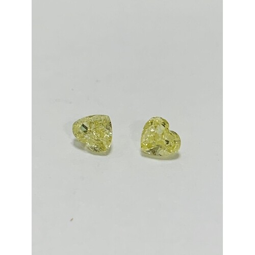 Two natural yellow (pair) heart shape diamond,1ct total,si2 ...