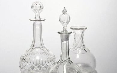 Two small decanters and stoppers and a carafe 19th century,...