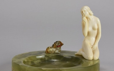 Vienna Bronze (early 20th C) - Carved ivory female figure kneeling on a green onyx tray next to a cold painted bronze ppmeranian dog. Circa 1920 - Height 9cm, Width 12cm.