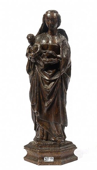 "Vierge à l’Enfant souriant" en chêne sculpté et peint. Travail du Brabant (?). Epoque: XVIème. (Légers *). H.(base comprise):+/-40,5cm.