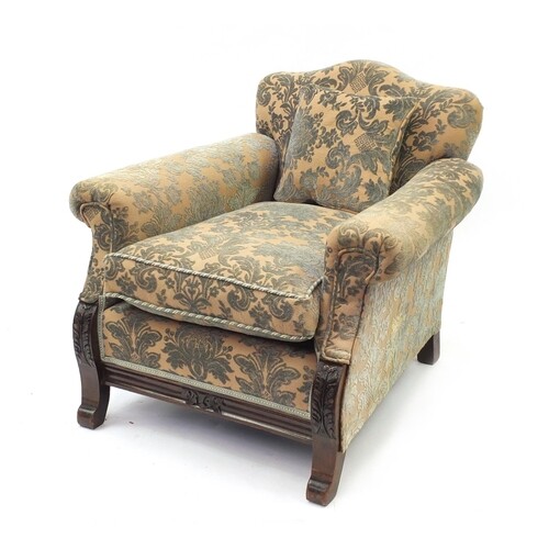Walnut framed fireside chair with acanthus carved feet and g...