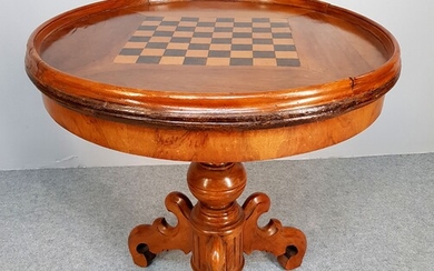 Walnut tripod game table, round top with inlaid chessboard. 19th...