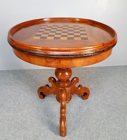 Walnut tripod game table, round top with inlaid chessboard. 19th...