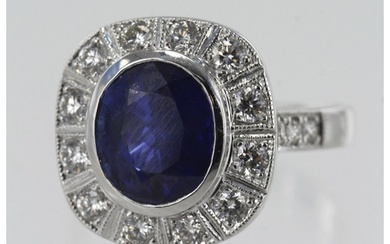 White gold (tests 18ct) diamond and sapphire cluster ring, o...