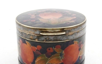William Moorcroft 'Pomegranate' pattern drum shaped box, circa 1920