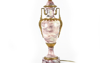 antique lidded vase in marble and gilded