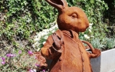 Garden sculpture of a Rabbit smoking the pipe