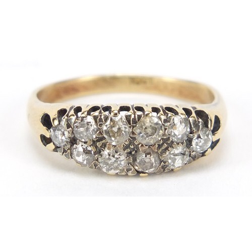 18ct gold and diamond two row cluster ring, set with ten dia...