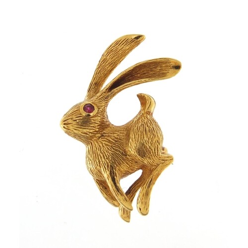 Grosse, 18ct gold brooch in the form of a hare with ruby eye...