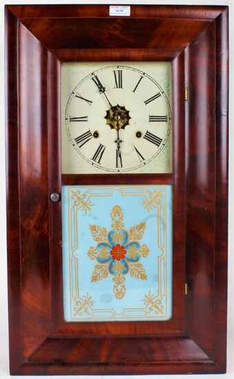 19th century American wall clock, Waterbury clock company, housed in a mahogany case, 65.5cm tall