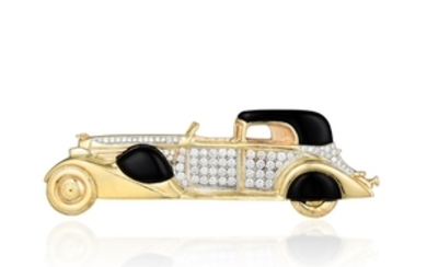 A 14K Gold Onyx and Diamond Car Brooch