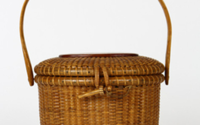 Jose Formoso Reyes Nantucket basket handbag circa 1960, executed in wood and rattan, having an ov...