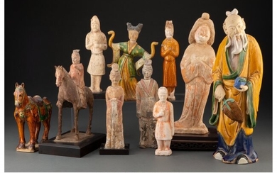 25070: A Group of Eight Polychrome Ceramic Figurines wi