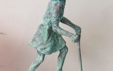 A SCULPTURE OF A GIRL RIDING SCOOTER ATTRIBUTED TO DAVID BROMLEY