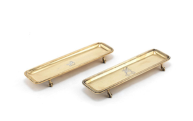 Banking interest: two silver-gilt pen trays