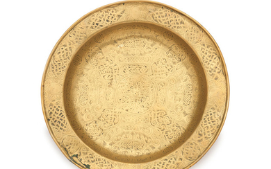 A mid-16th century engraved brass dish, Venetian, circa 1500 - 1550