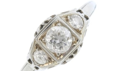 A mid 20th century diamond three-stone ring. The