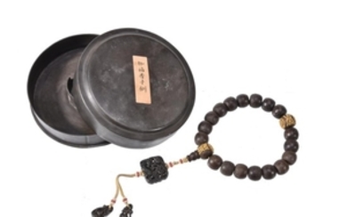 A string of Chinese wood rosary beads