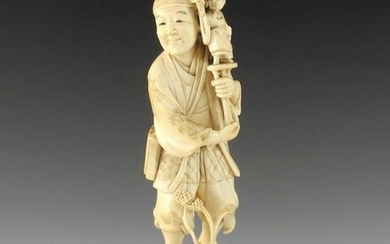 A 19th century Japanese carved ivory oki