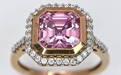 A 9K Rose Gold Pink Stone Set Cocktail Ring....