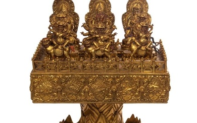 A BRONZE-GILT FIGURE OF BUDDHA SEATED STATUE