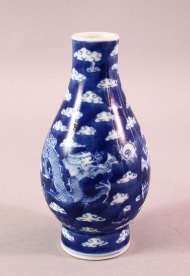 A CHINESE BLUE & WHITE PORCELAIN DRAGON VASE, with