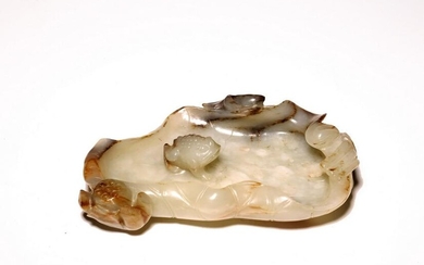 A CHINESE MOTTLED WHITE AND RUSSET LOTUS WASHER