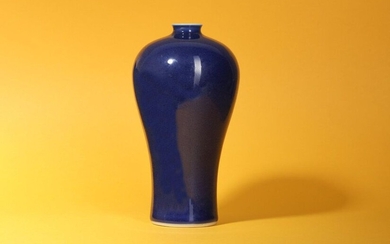 A CHINESE POWDER BLUE GLAZED VASE, MEIPING. Qing Dynasty, 18th Century. The tapered body with a bulging shoulder and a narrow short neck decorated with a monochrome blue glaze, 20cm H. Provenance: an English private collection. 清十八世紀 灑藍地梅瓶 來源：英国私人收藏。
