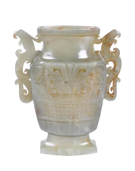 A Chinese celadon and russet jade archaistic vase