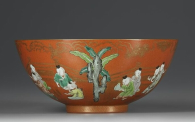 A FINE CHINESE CORAL-GROUND FAMILLE VERTE 'BOYS' BOWL