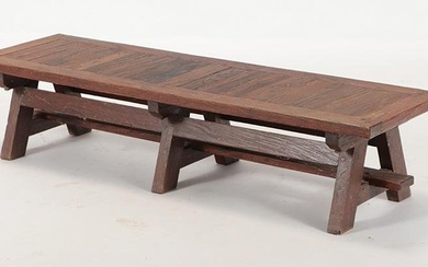 A French oak bench of architectural form. Ht: 12" Wd: 54.5" Dpth: 15.75"