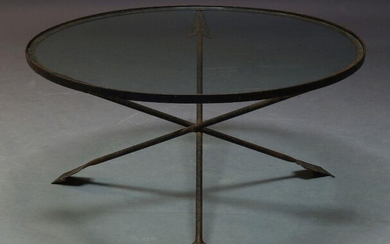 A French wrought iron and glazed coffee table, c.1960s, the...