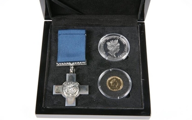 A GEORGE CROSS GOLD AND SILVER PROOF SET, comprising a