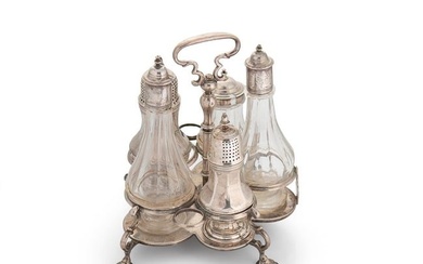 A George II silver 5 bottle cruet stand with later cruets