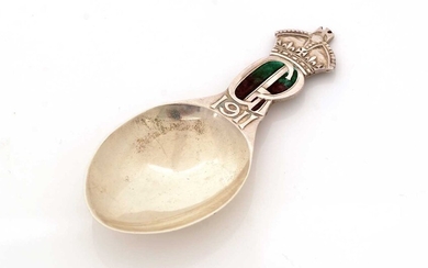 A George V silver coronation commemorative caddy spoon.