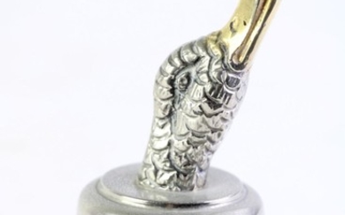 A Gucci silver plated bottle stopper with duck head finial