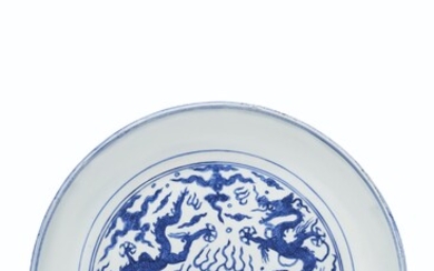 A LARGE BLUE AND WHITE 'DRAGON' DISH, JIAJING SIX-CHARACTER MARK IN UNDERGLAZE BLUE IN A LINE AND OF THE PERIOD (1522-1566)