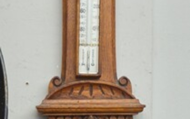 A LATE VICTORIAN OAK CASED COMBINATION THERMOMETER/BAROMETER, 95 CM LONG