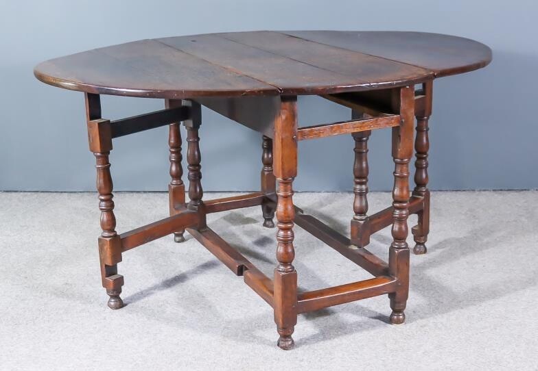A Late 17th Century Oak Oval Gateleg Table, fitted...