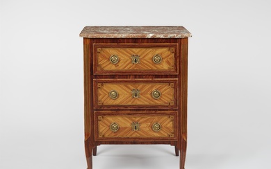 A Louis XVI style chest of drawers