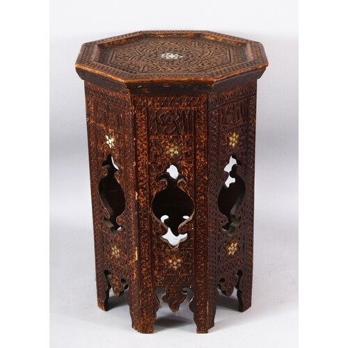 A MOORISH OCTAGONAL OCCASIONAL TABLE with carved decoration,...