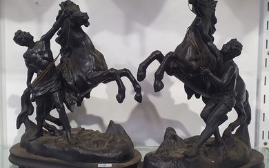 A PAIR OF CAST METAL 'COUSTOU STYLE' MARLEY HORSE FIGURES