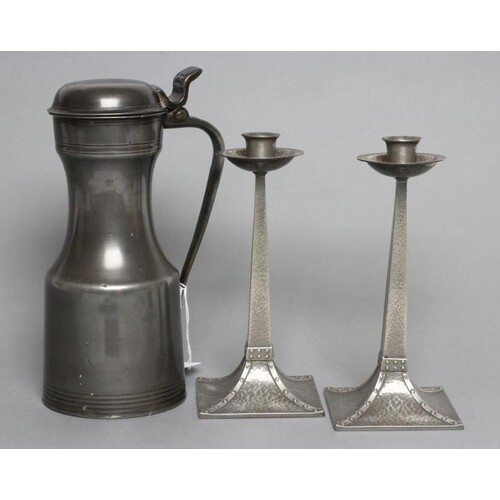 A PAIR OF "CORNISH" PEWTER ARTS AND CRAFTS STYLE CANDLESTICK...