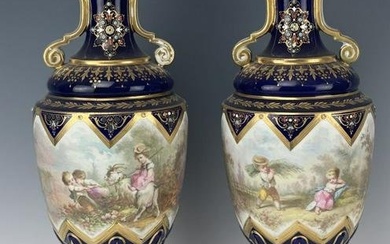 A PAIR OF JEWELED SEVRES PORCELAIN VASES
