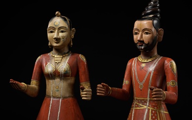 A PAIR OF LARGE GANGAUR FESTIVAL SCULPTURES DEPICTING SHIVA AND PARVATI