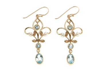 A PAIR OF NOUVEAU STYLE TOPAZ AND PEARL EARRINGS; 9ct gold open frames set with seed pearls and articulated topaz drops on shepherd...